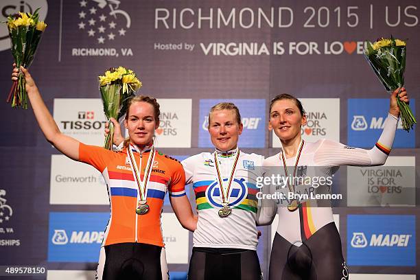 Anna Van der Breggen of the Netherlands, Linda Melanie Villumsen of New Zealand and Lisa Brennauer of Germany stand on the podium for the Women's...