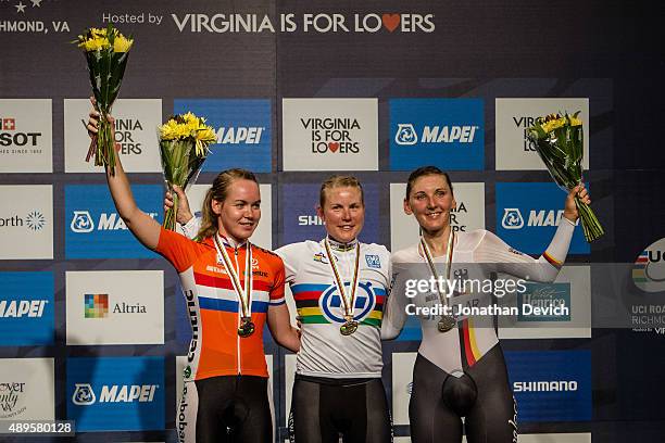 Linda Villumsen riding for the New Zealand National Team gets the rainbow jersey after winning the time trial with Anna Van Der Bergen riding for the...