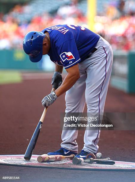 Will Venable of the Texas Rangers stands on deck in the first inning during the MLB game against the Los Angeles Angels of Anaheim at Angel Stadium...