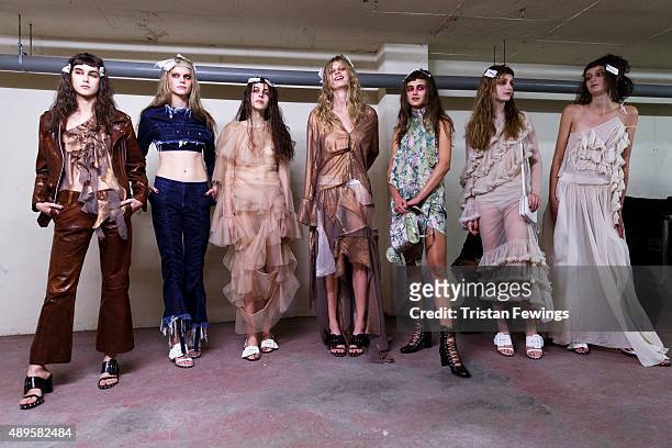 Models backstage ahead of the Marques'Almeida show during London Fashion Week Spring/Summer 2016 on September 22, 2015 in London, England.