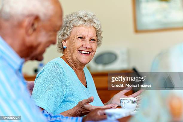 senior woman spending leisure time with friends - 70 79 years stock pictures, royalty-free photos & images