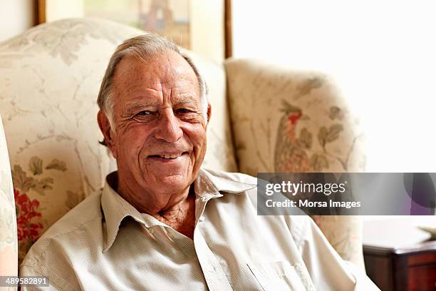 contented senior man in nursing home - nursing home smiling ストックフォトと画像