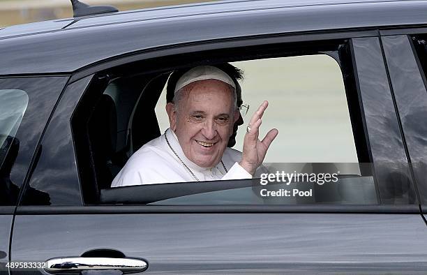 Pope Francis departs in a Fiat after arriving from Cuba September 22, 2015 at Joint Base Andrews, Maryland. Francis will be visiting Washington, New...