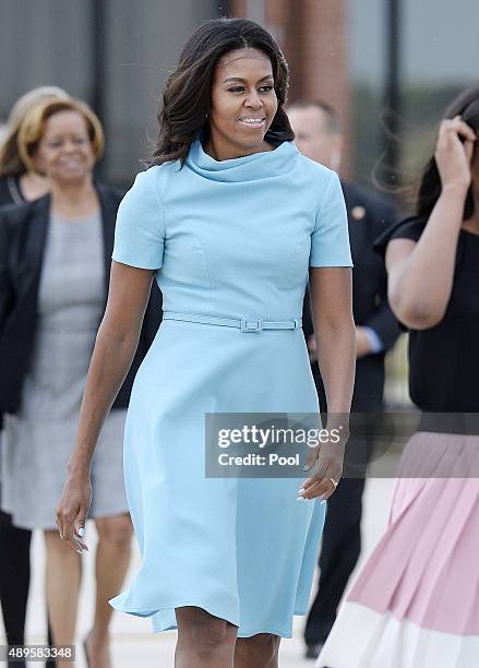 First Lady Michelle Obama with daughters Sasha and Malia arrive to welcome His Holiness Pope Francis on his arrival from Cuba September 22, 2015 at...