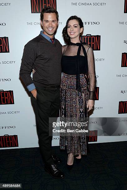 Actor Andrew Rannells and actress Anne Hathaway attend a screening of Warner Bros. Pictures' "The Intern" hosted by The Cinema Society and Ruffino on...