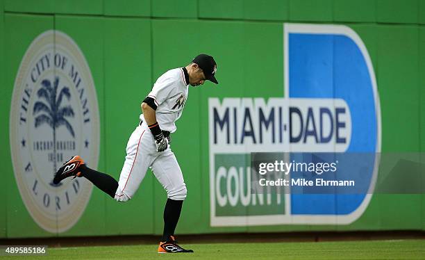 Ichiro Suzuki of the Miami Marlins warms up during a game against the Philadelphia Phillies at Marlins Park on September 22, 2015 in Miami, Florida.