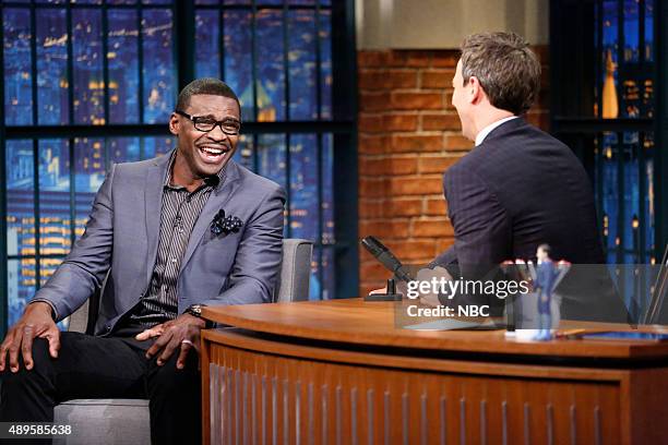 Episode 262 -- Pictured: Former football player, Michael Irvin, during an interview with host Seth Meyers on September 22, 2015 --