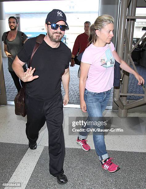 Ricky Gervais and Jane Fallon are seen at LAX on September 22, 2015 in Los Angeles, California.