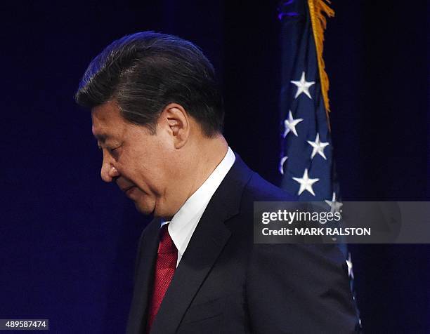 Chinese President Xi Jinping leaves after speaking during his welcoming banquet at the start of his visit to the United States, at the Westin Hotel...