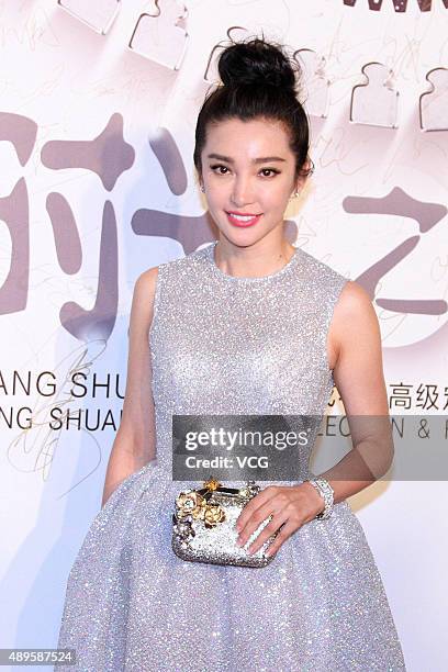 Actress Li Bingbing poses on the red carpet during the Zhang Shuai 2016 S/S Collection & Haute Couture at National Agricultural Exhibition Center on...