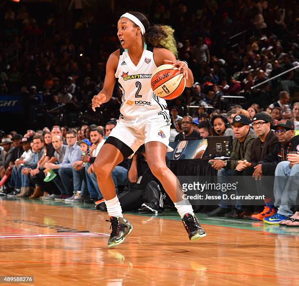 Candice Wiggins of the New York Liberty dribbles the ball against the Washington Mystics during game One of the WNBA Semi-Finals at Madison Square...