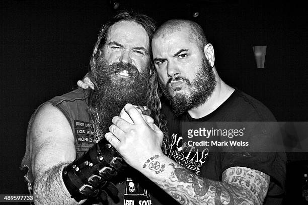 Zakk Wylde of Black Label Society and Phil Anselmo of Down after their performance of Pantera's "I'm Broken" with Black Label Society at Best Buy...