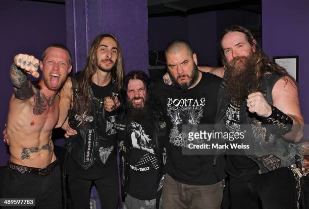 Jeff Fabb, Dario Lorina, John DeServio of Black Label Society, Phil Anselmo of Down and Zakk Wylde of Black Label Society after their performance of...