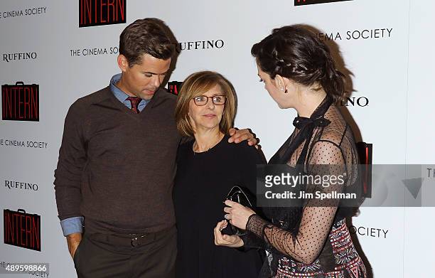 Actor Andrew Rannells, director Nancy Meyers and Anne Hathaway attend the The Cinema Society and Ruffino host a screening of Warner Bros. Pictures'...