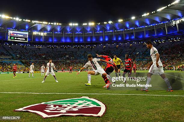 Gum and Rafael Sobis of Fluminense struggles for the ball with Negueba of Flamengo during a match between Fluminense and Flamengo as part of...