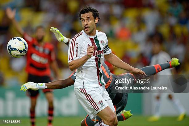 Fred of Fluminense battles for the ball with Felipe of Flamengo during the match between Fluminense and Flamengo as part of Brasileirao Series A 2014...