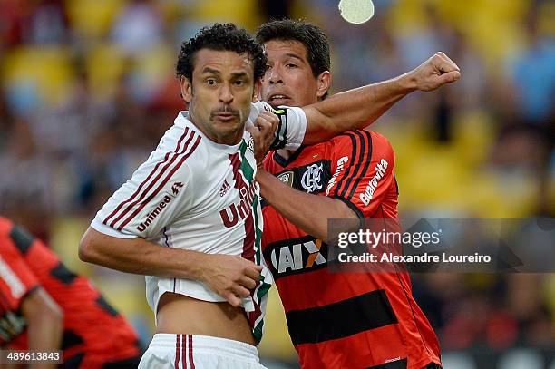 Fred of Fluminense battle with Caceres of Flamengo during the match between Fluminense and Flamengo as part of Brasileirao Series A 2014 at Maracana...