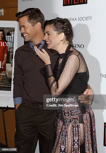 Actors Andrew Rannells and Anne Hathaway attend the The Cinema Society and Ruffino host a screening of Warner Bros. Pictures' "The Intern" at the...