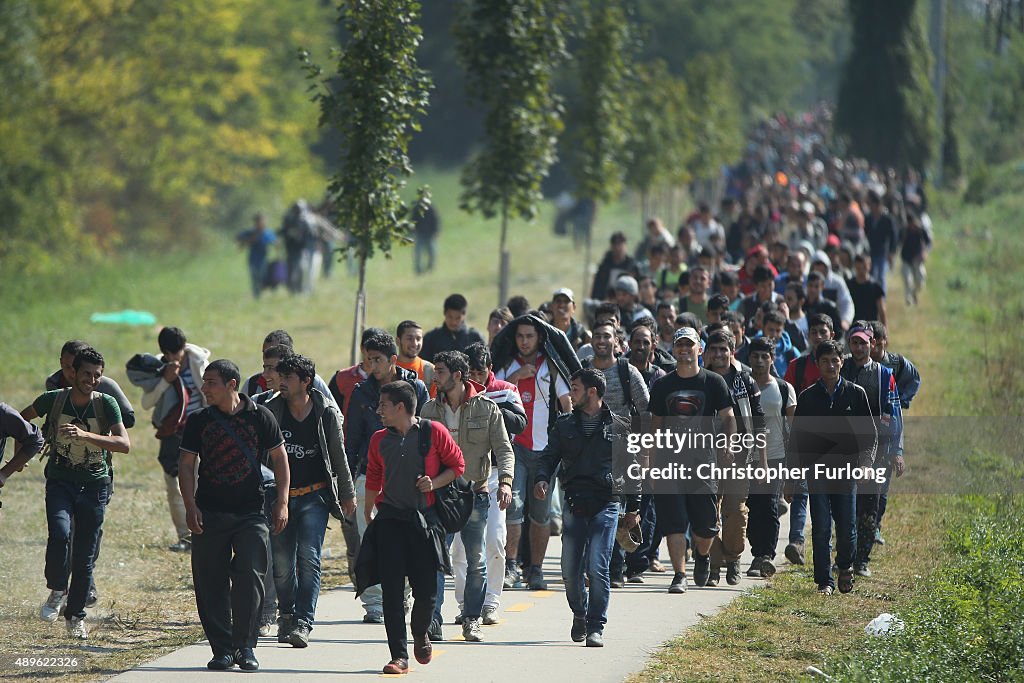 Migrants Cross From Hungary Into Austria On Route To Northern Europe