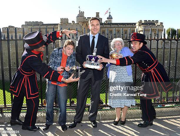 David Walliams , Ashley Cousins and Gilly Tompkins attend a photocall to launch "Gangsta Granny Live" at Tower of London on September 23, 2015 in...