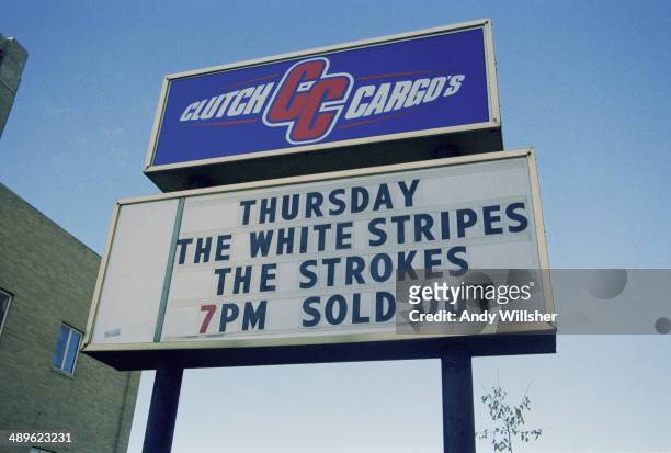 Sign publicising a sold-out concert by American rock groups The White Stripes and The Strokes, outside the Clutch Cargo's venue in Pontiac, Michigan,...