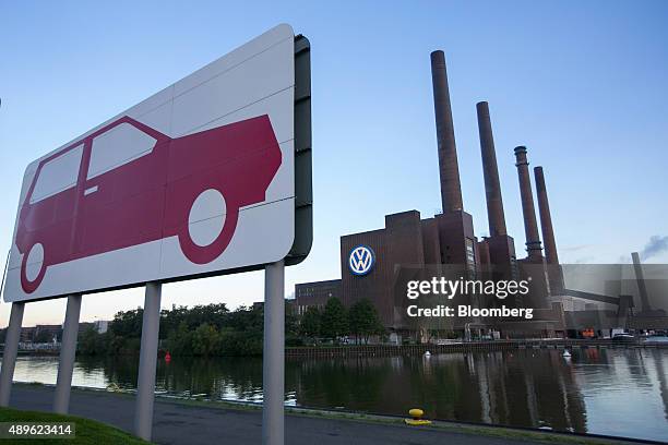 Logo sits on display outside the power plant at the Volkswagen AG headquarters in Wolfsburg, Germany, on Wednesday, Sept. 23, 2015. Volkswagen's...