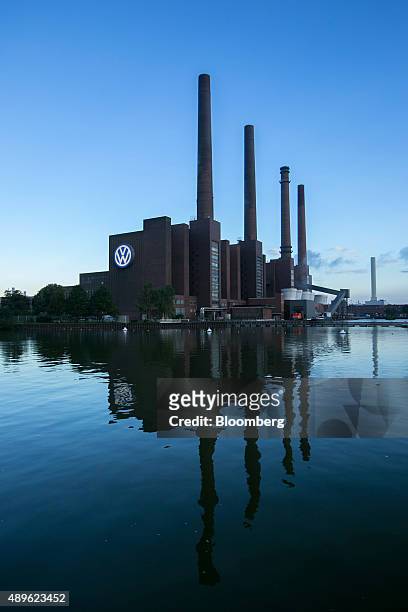 Logo sits on display outside the power plant at the Volkswagen AG headquarters in Wolfsburg, Germany, on Wednesday, Sept. 23, 2015. Volkswagen's...