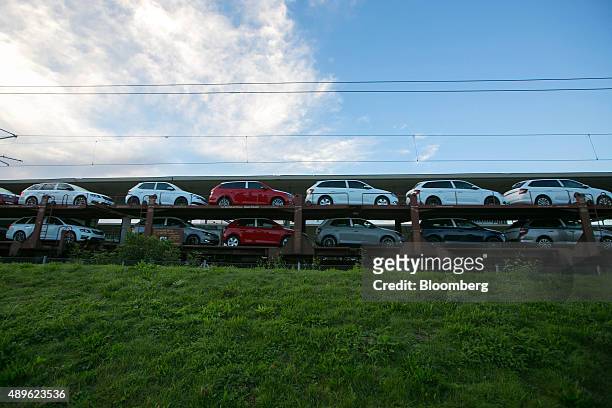 Skoda automobiles, produced by Volkswagen AG , sit on railway freight transporters near the VW headquarters in Wolfsburg, Germany, on Wednesday,...