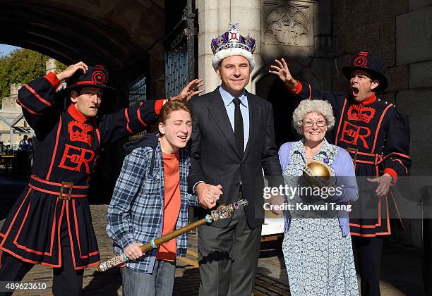 David Walliams , Ashley Cousins and Gilly Tompkins attend a photocall to launch "Gangsta Granny Live" at Tower of London on September 23, 2015 in...