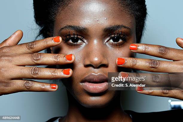 Model, detail, is seen backstage ahead of the Stella Jean show during Milan Fashion Week Spring/Summer 2016 on September 23, 2015 in Milan, Italy.