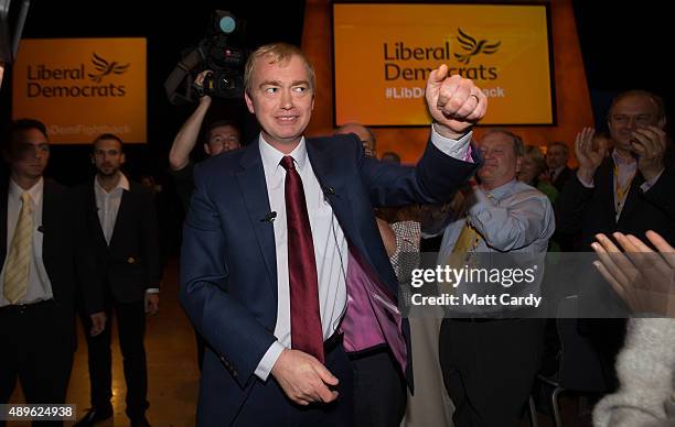 Liberal Democrat leader Tim Farron is congratulated as he leaves the main hall following his leader's speech on the final day of the Liberal...