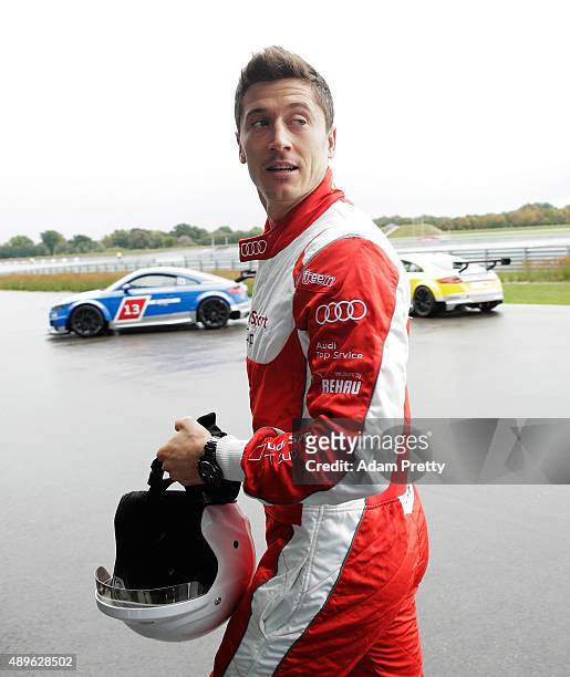 Robert Lewandowski of Bayern Munich leaves the track after the Audi Driving Experience and the Audi to FC Bayern Muenchen new car handover event on...