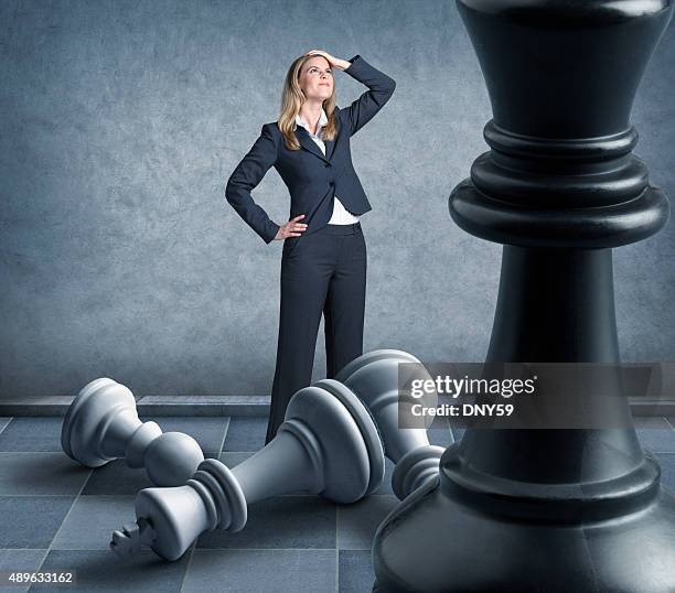 business strategy - chess board businessman stock-fotos und bilder