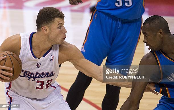 Blake Griffith of the Los Angeles Clippers controls the ball against Serge Ibaka of the Oklahoma City Thunder in game 4 of their NBA playoff series,...