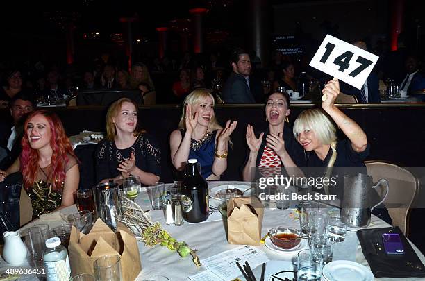 Sia bids at The LA Gay & Lesbian Center's Annual "An Evening With Women" at The Beverly Hilton Hotel on May 10, 2014 in Beverly Hills, California.