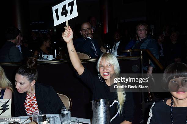 Sia bids at The LA Gay & Lesbian Center's Annual "An Evening With Women" at The Beverly Hilton Hotel on May 10, 2014 in Beverly Hills, California.