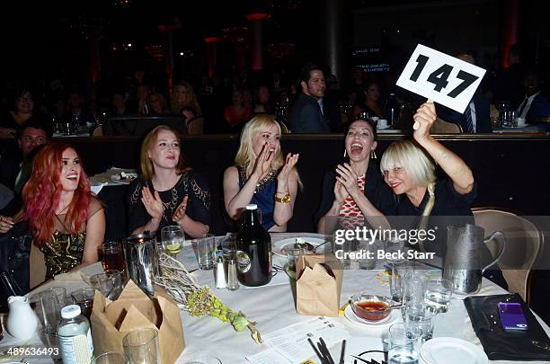 Sia bids at The LA Gay & Lesbian Center's Annual "An Evening With Women" at The Beverly Hilton Hotel on May 10, 2014 in Beverly Hills, California.