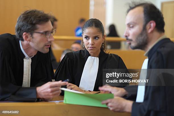 French lawyer Celine Lendo stands next to colleagues prior to the start of the trial of his client, a 19-year-old man who was placed under a...