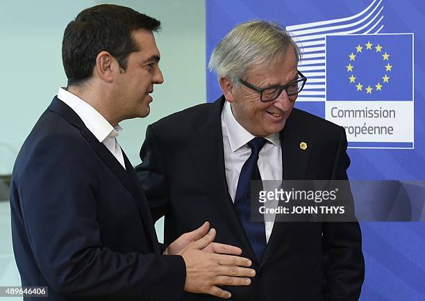 European Commission President Jean-Claude Juncker welcomes Greek Prime Minister Alexis Tsipras on September 23, 2015 before to their bilateral...
