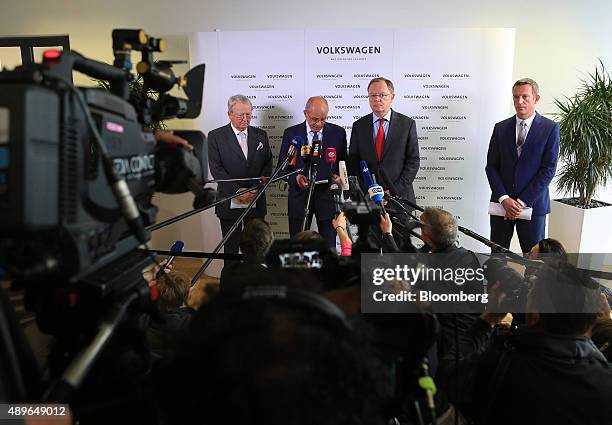 Berthold Huber, interim chairman of Volkswagen AG , second left, speaks while announcing the resignation of VW Chief Executive Officer Martin...