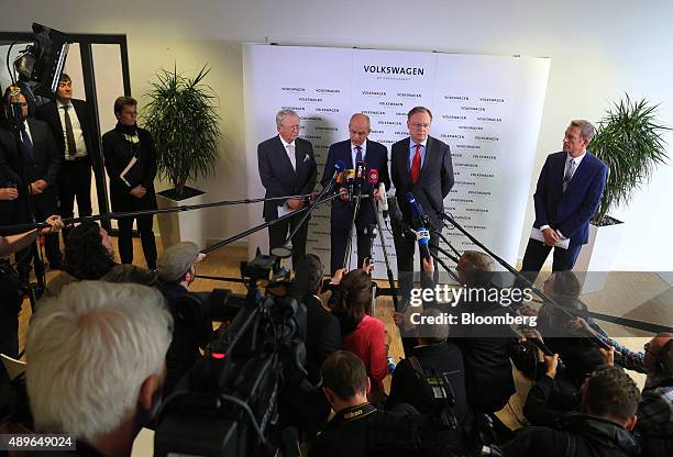 Berthold Huber, interim chairman of Volkswagen AG , second left, speaks while announcing the resignation of VW Chief Executive Officer Martin...