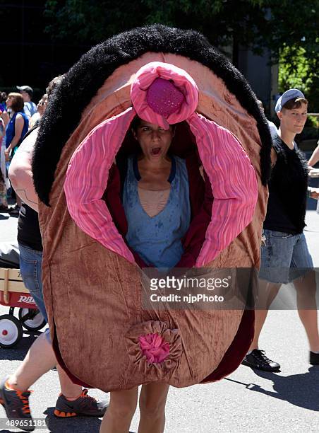 pride parade participants - vulva stock pictures, royalty-free photos & images