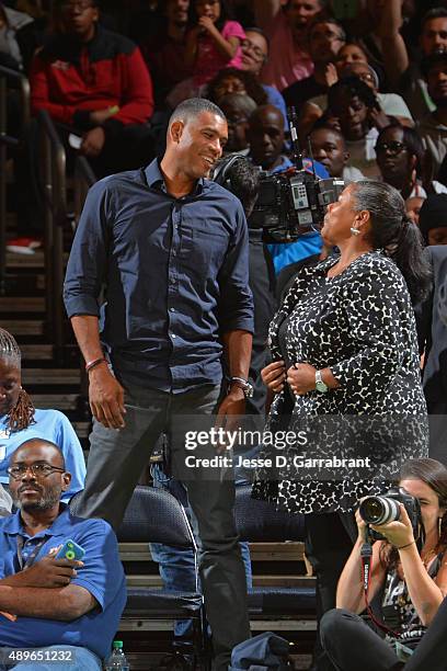 Former NBA player Allan Houston and Laurel J. Richie is the President of the WNBA attend Game One of the WNBA Semifinals, Washington Mystics against...