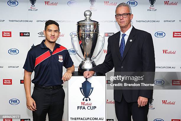 Kaz Patafta and FFA CEO, David Gallop pose with the Westfield FFA Cup during an FFA Cup Announcement at the FFA Offices on May 12, 2014 in Sydney,...