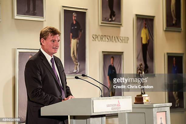 Ernie Els of South Africa speaks after receiving the Payne Stewart Award at a ceremony held following practice for the TOUR Championship by...