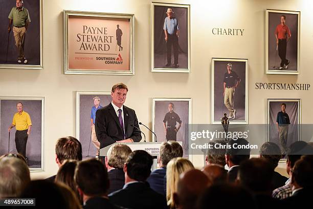 Ernie Els of South Africa speaks after receiving the Payne Stewart Award at a ceremony held following practice for the TOUR Championship by...