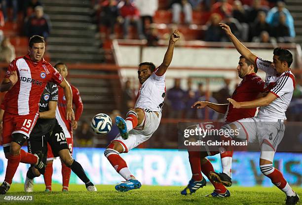 Gabriel Mercado of River Plate kicks the ball to score the opening goal during a match between Argentinos Juniors and River Plate as part of 18th...