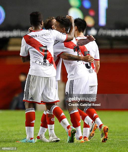 Teofilo Gutierrez of River Plate and teammates celebrate their team's second goal during a match between Argentinos Juniors and River Plate as part...