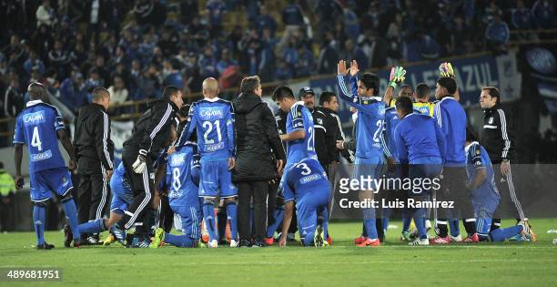 Players of Millonarios look dejected after losing the match between Millonarios FC and Atletico Junior as part of the second leg of the Liga Postobon...