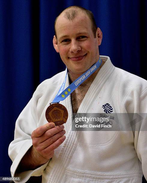 Royal Marine and Olympian, Chris Sherrington, proudly holds his heavyweight bronze medal during the London British Open Senior European Judo Cup at...